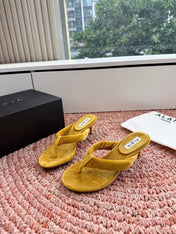 ALAIA 26S HEELED THONG SANDALS IN MUSTARD YELLOW VELVET