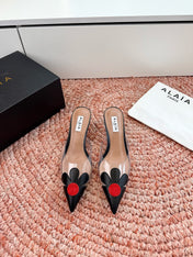 ALAIA 26S POINTED-TOE MULE HEELS IN BLACK LAMBSKIN AND TRANSPARENT PVC
