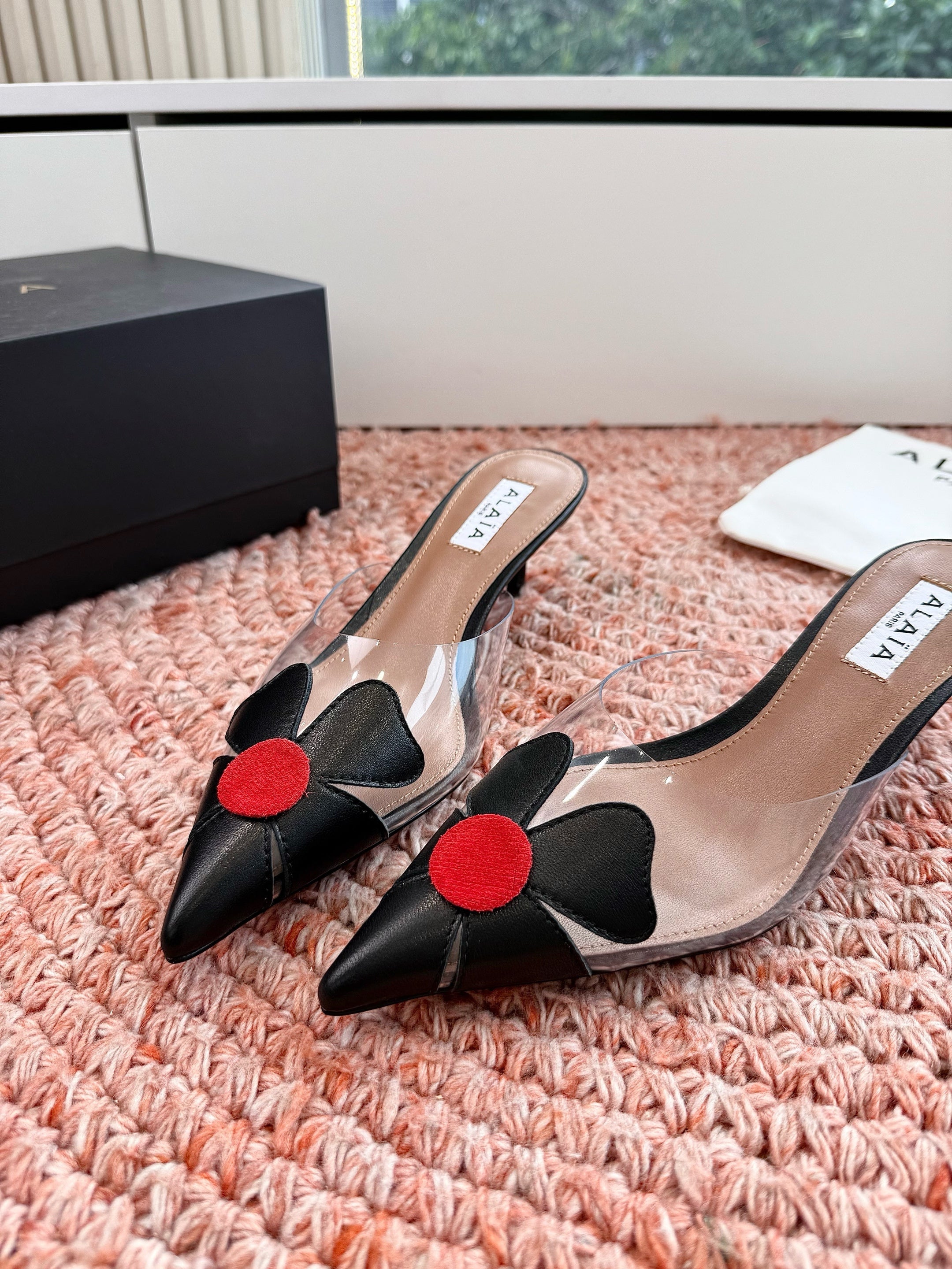 ALAIA 26S MULE HEELS IN BLACK LAMBSKIN AND TRANSPARENT PVC