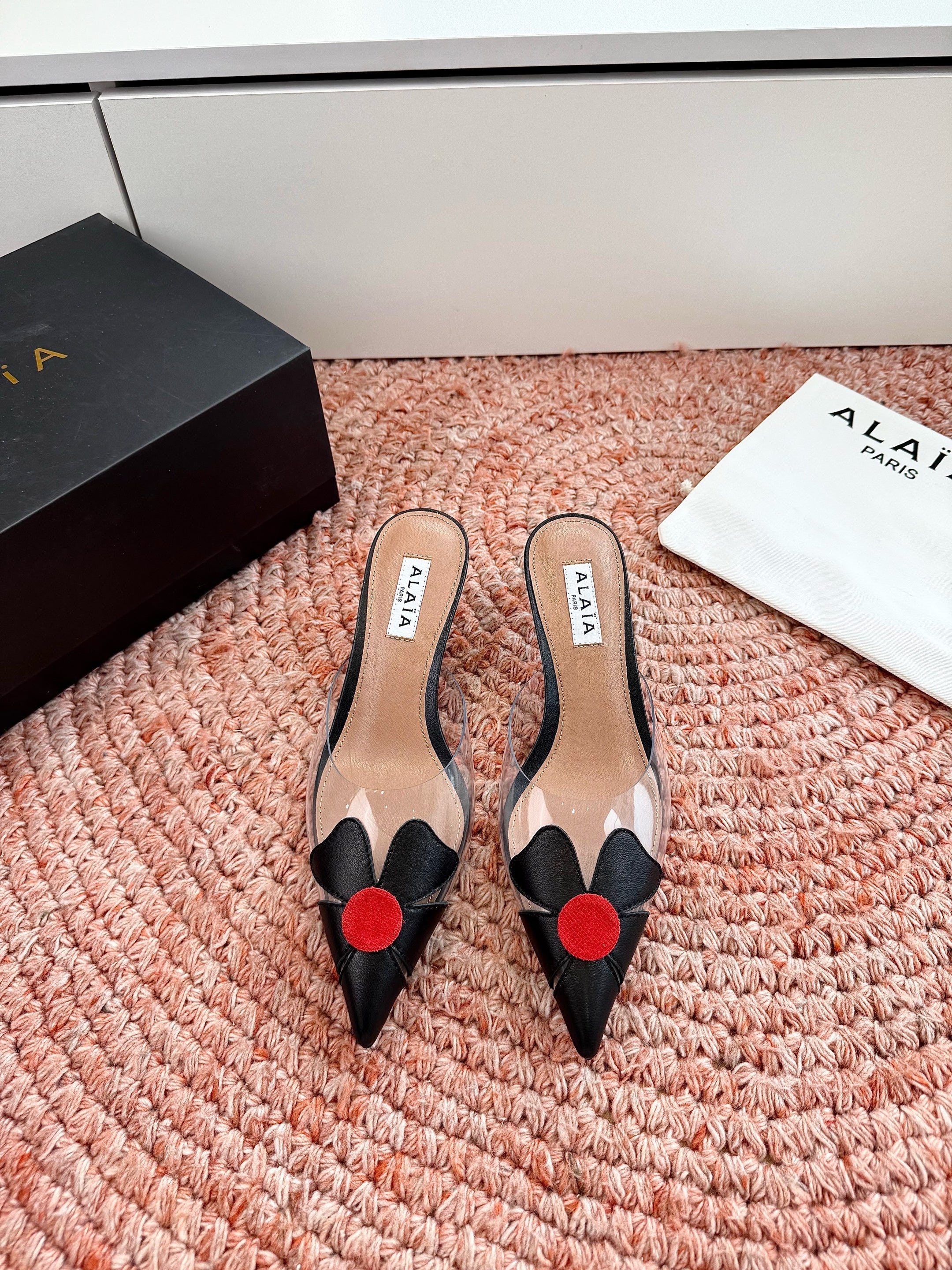 ALAIA 26S MULE HEELS IN BLACK LAMBSKIN AND TRANSPARENT PVC