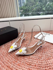 ALAIA 26S POINTED-TOE SLINGBACK HEELS IN WHITE LAMBSKIN AND TRANSPARENT PVC