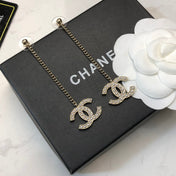 CHANEL 26S DOUBLE C LOGO PEARL PAVE DROP CHAIN EARRINGS IN GOLD METAL 631010