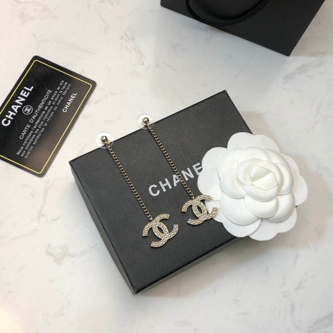 CHANEL 26S DOUBLE C LOGO PEARL PAVE DROP CHAIN EARRINGS IN GOLD METAL 631010