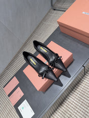 MIUMIU 26S POINTED TOE PUMPS 55MM IN BLACK CALFSKIN WITH BOW