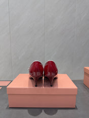MIUMIU 26S POINTED TOE PUMPS 55MM IN DARK RED CALFSKIN WITH BOW