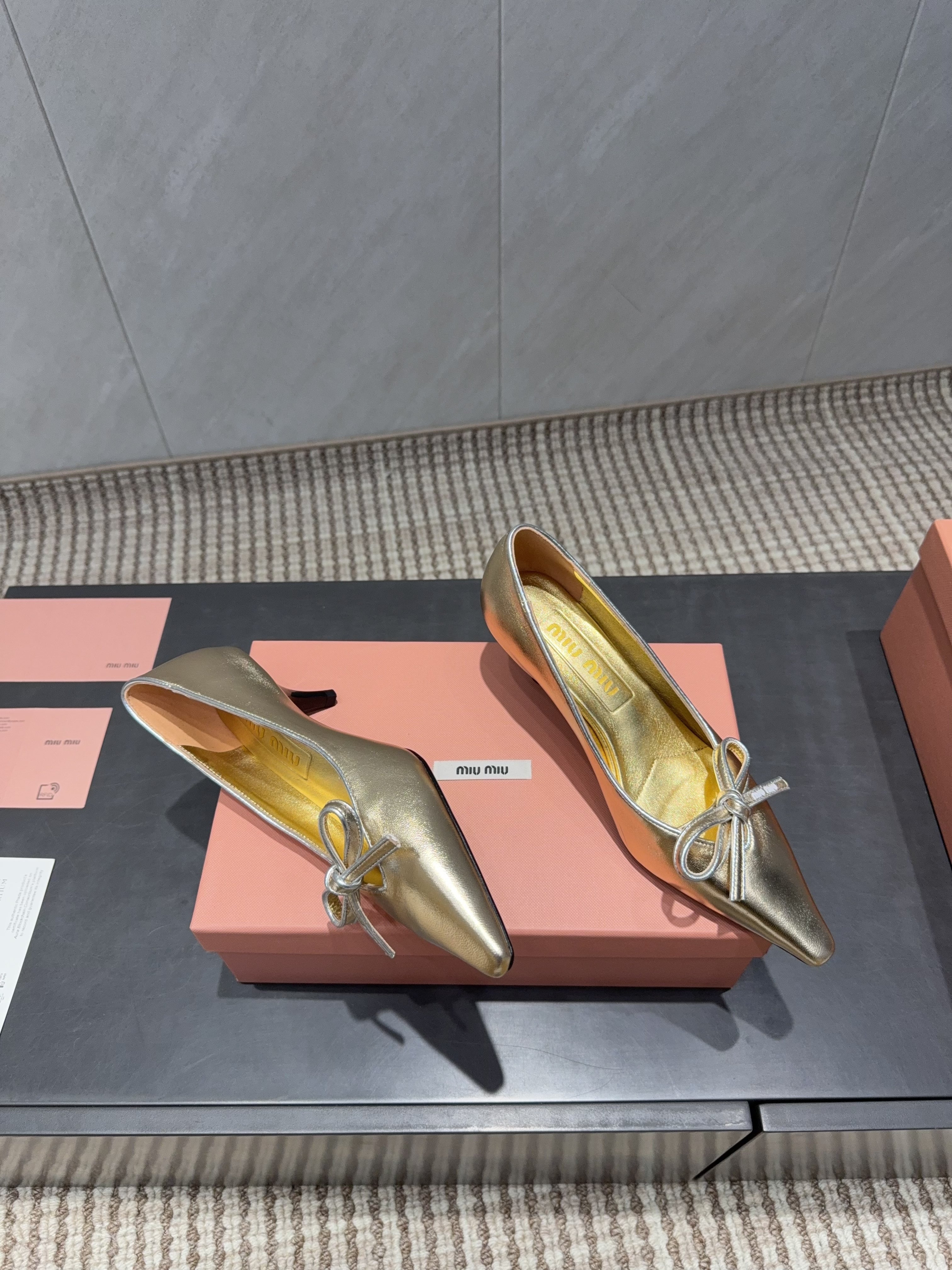 MIUMIU 26S POINTED TOE PUMPS 55MM IN GOLD CALFSKIN WITH BOW