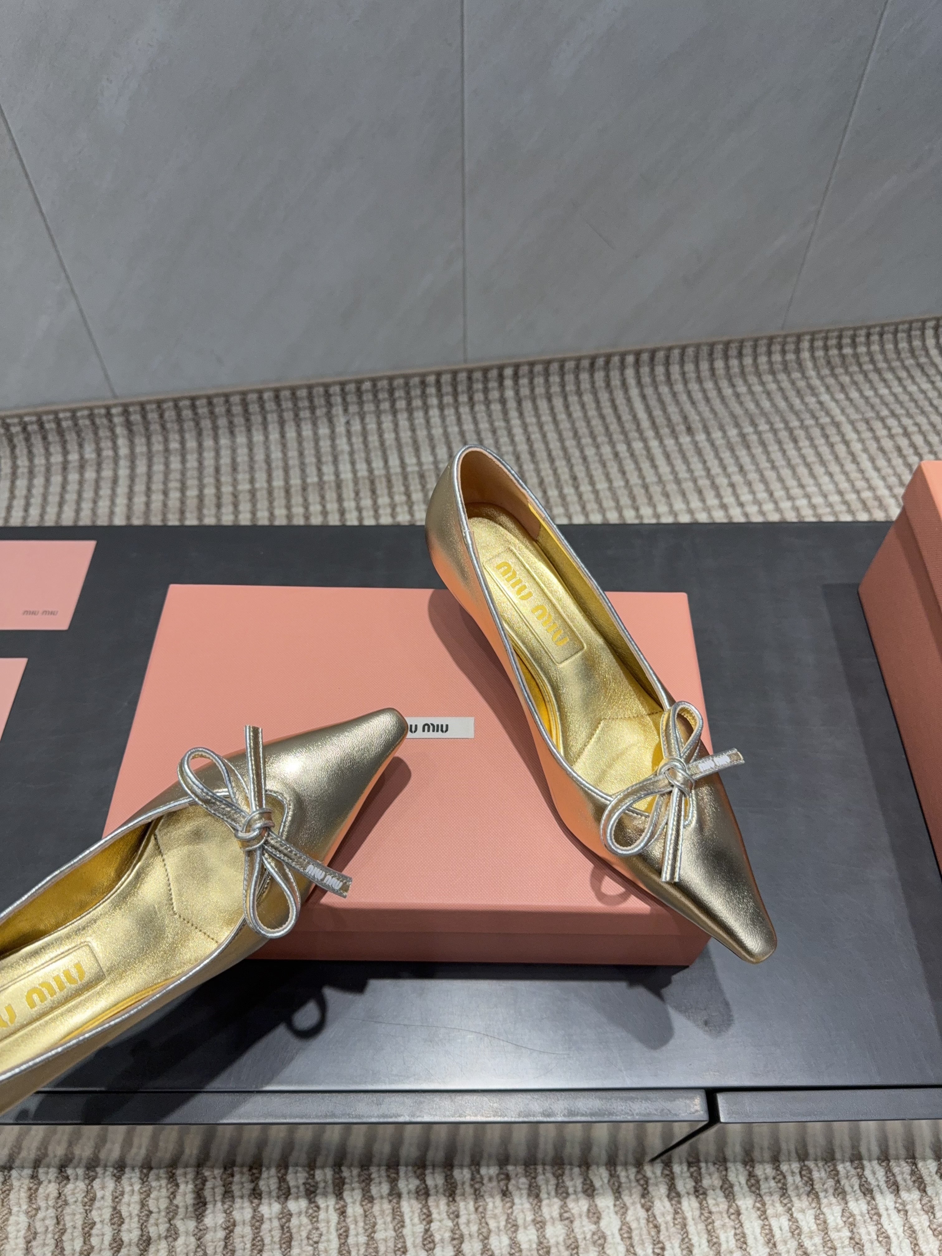 MIUMIU 26S POINTED TOE PUMPS 55MM IN GOLD CALFSKIN WITH BOW