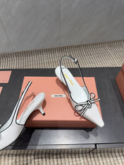 MIUMIU 26S SLINGBACK 55MM IN WHITE AND BLACK CALFSKIN WITH BOW