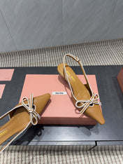 MIUMIU 26S SLINGBACK 55MM IN CARAMEL BROWN CALFSKIN WITH BOW