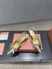 MIUMIU 26S SLINGBACK 55MM IN GOLD CALFSKIN WITH BOW