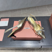 MIUMIU 26S SLINGBACK 55MM IN GOLD CALFSKIN WITH BOW