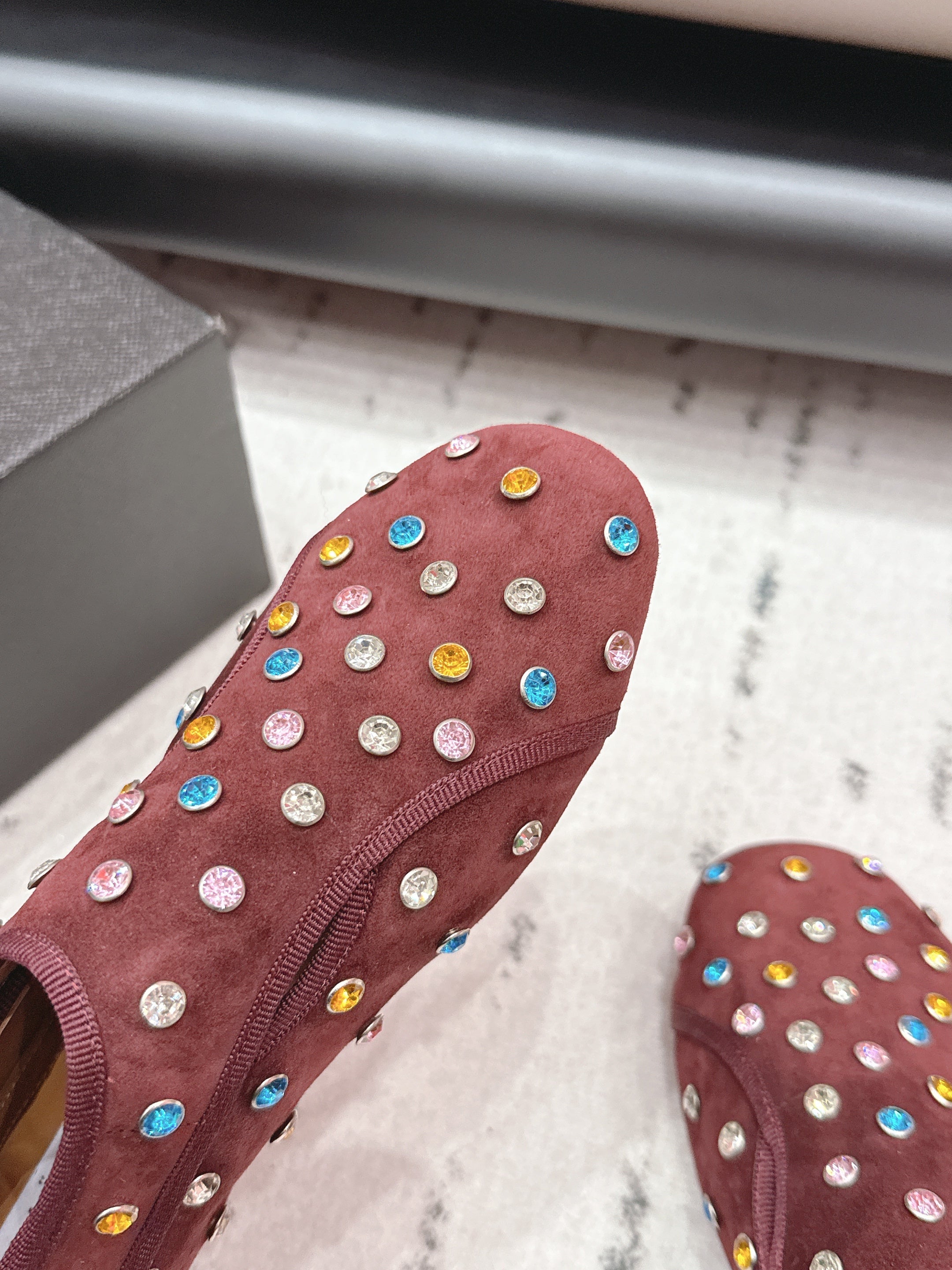ALAIA 26S EMBELLISHED FLATS IN BROWN SUEDE
