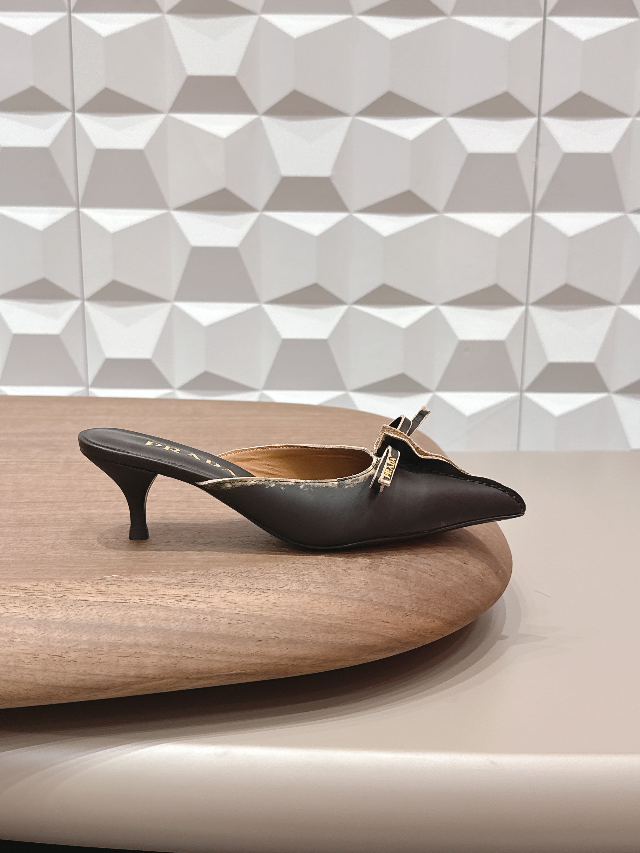 PRADA 26S POINTED TOE LACE TRIM MULES 55MM IN BLACK CALFSKIN WITH BOW