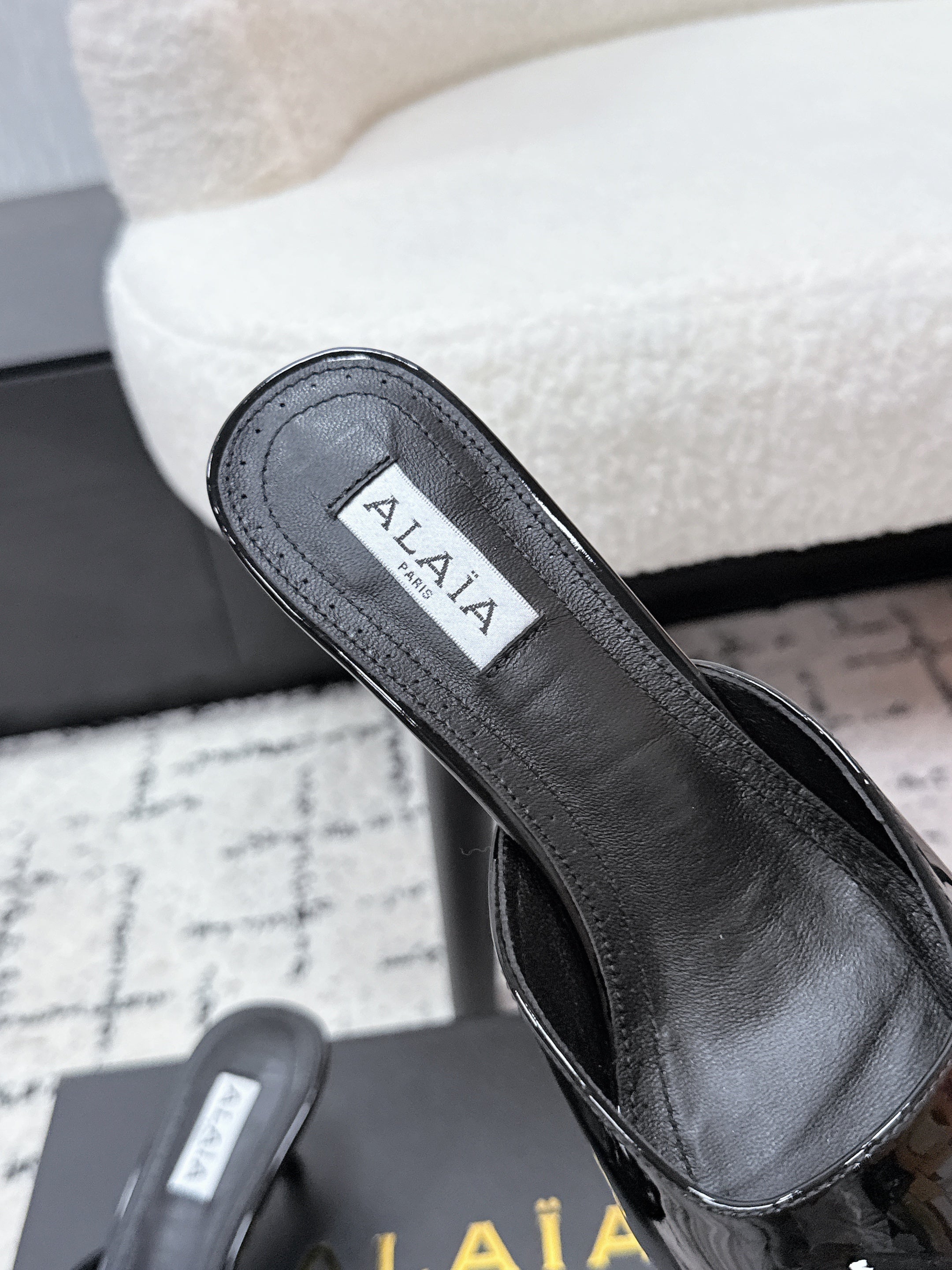 ALAIA 26S HEELED MULES 65 MM IN BLACK GLOSSY CALFSKIN