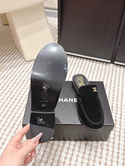 CHANEL 26S LOAFER MULES IN BLACK SUEDE