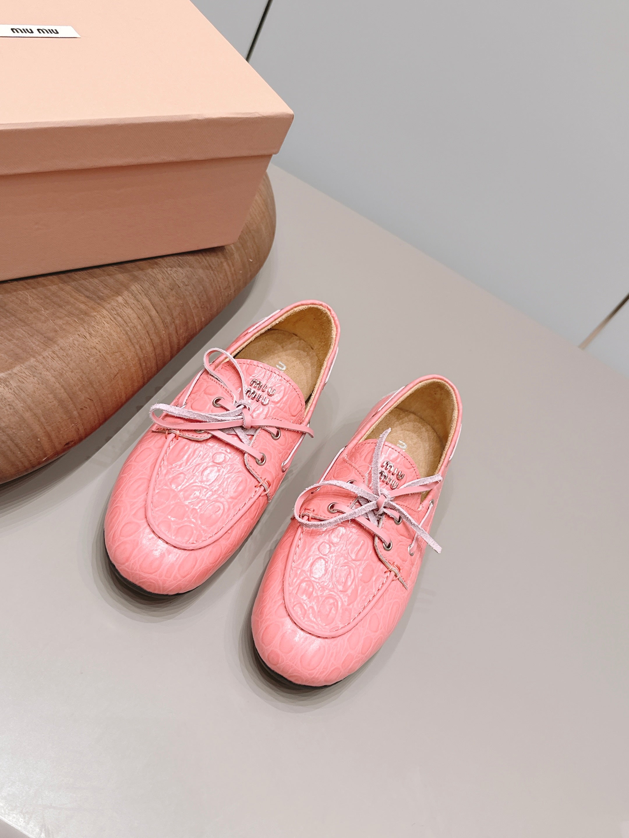 MIUMIU 26S BOAT SHOES IN PINK EMBOSSED CALFSKIN