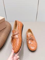 MIUMIU 26S BOAT SHOES IN ORANGE BROWN EMBOSSED CALFSKIN