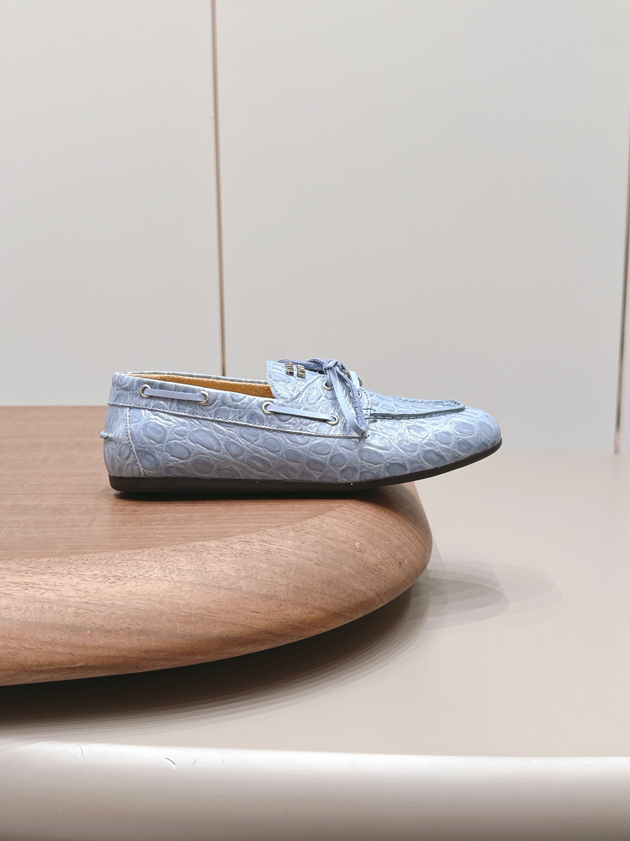 MIUMIU 26S BOAT SHOES IN BLUE EMBOSSED CALFSKIN