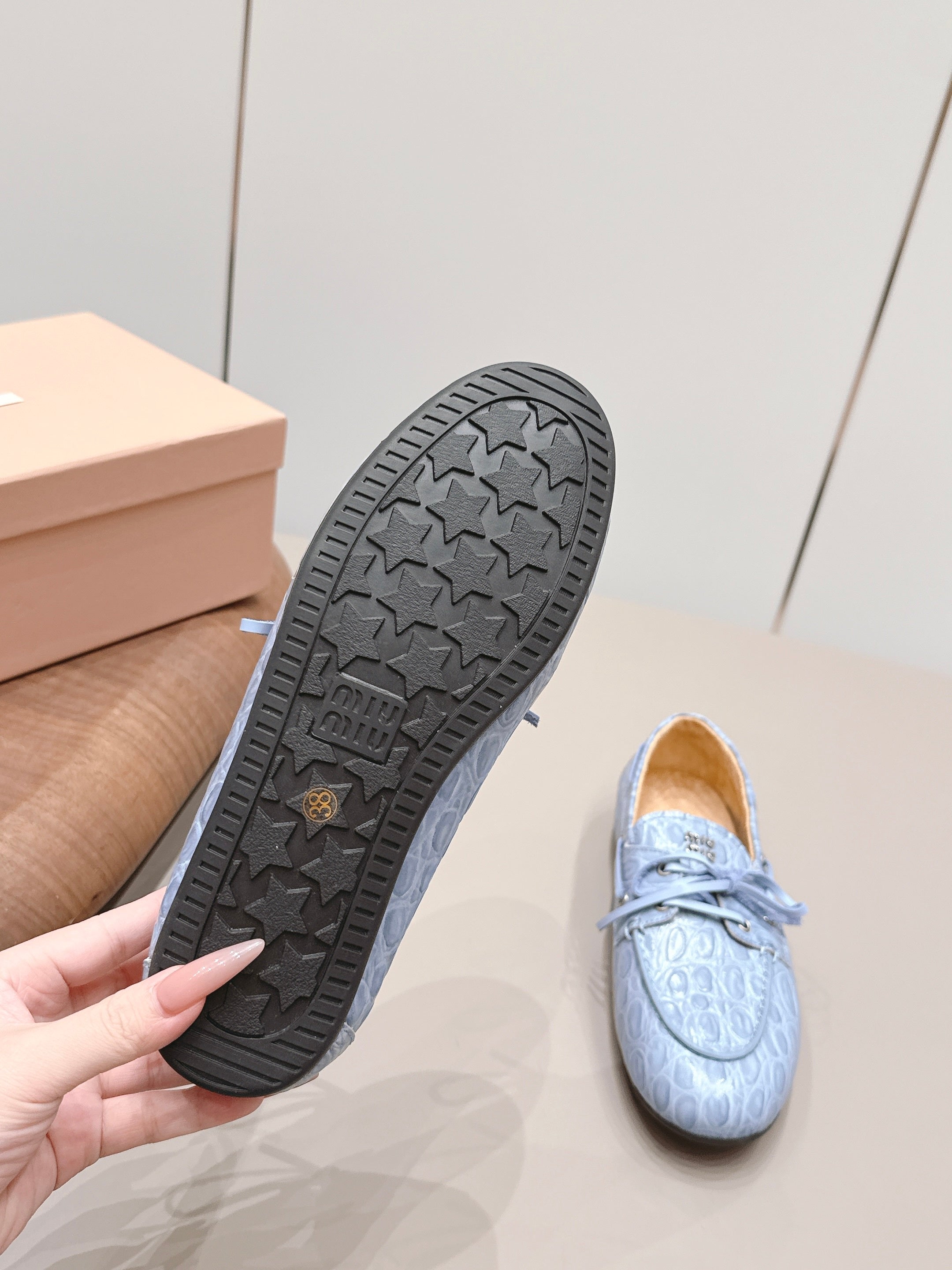 MIUMIU 26S BOAT SHOES IN BLUE EMBOSSED CALFSKIN