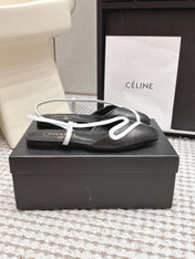 CHANEL 26S SLINGBACK FLATS IN BLACK CALFSKIN WITH WHITE TRIM