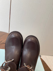 PRADA 25S TWO-BUTTON COWBOY BOOTS IN DARK BROWN CALFSKIN WITH SILVER HARDWARE
