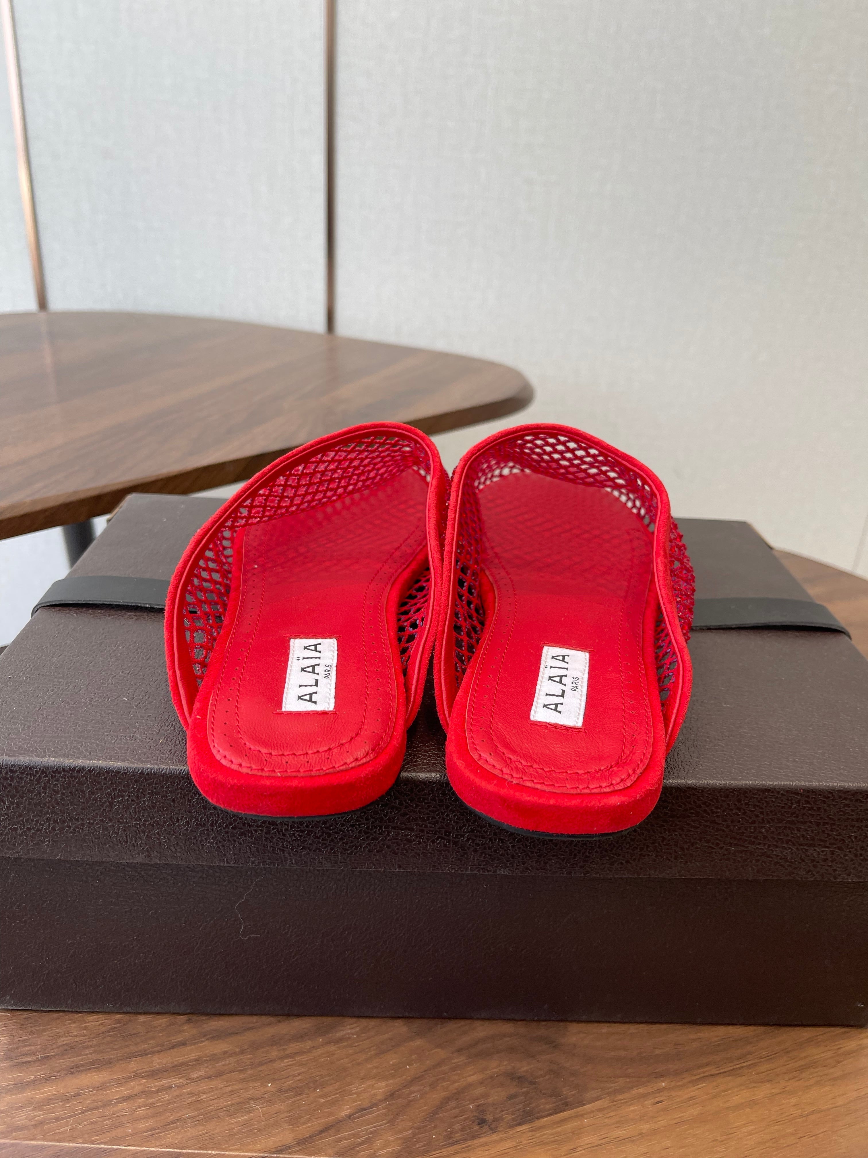 ALAIA 26S FLAT MULES IN RED SUEDE AND MESH RHINESTONE-EMBELLISHED