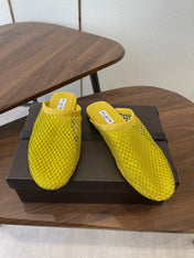 ALAIA 26S FLAT MULES IN DARK YELLOW SUEDE AND MESH RHINESTONE-EMBELLISHED