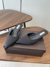 ALAIA 26S HEELED MULES 50 MM IN BLACK FABRIC
