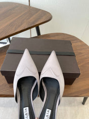 ALAIA 26S HEELED MULES 50 MM IN LAVENDER GREY FABRIC