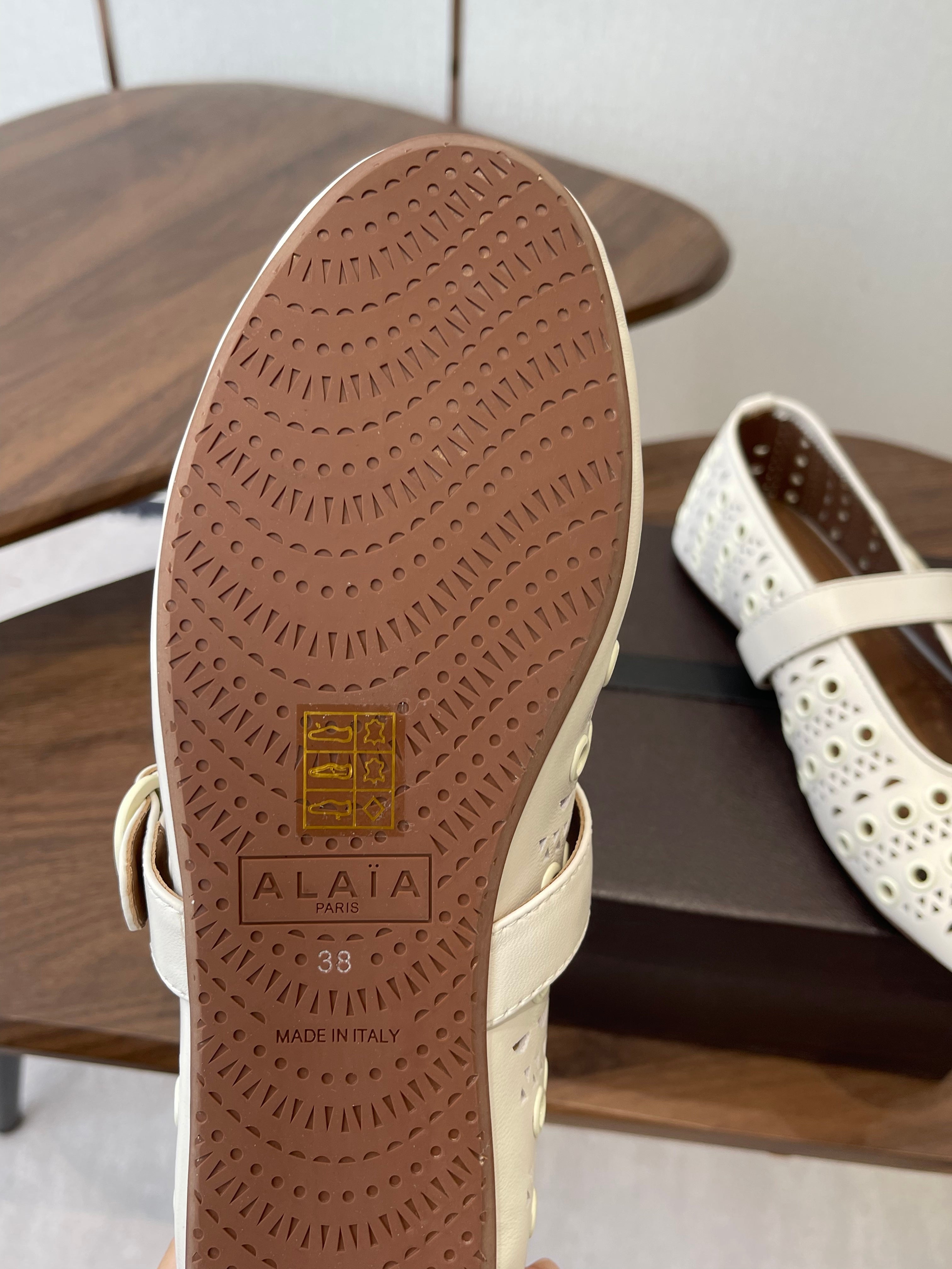 ALAIA 26S MARY JANE FLATS IN WHITE LAMBSKIN
