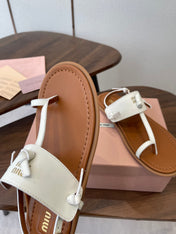 MIUMIU 26S FLIP FLOPS IN WHITE AND TAN BROWN CALFSKIN