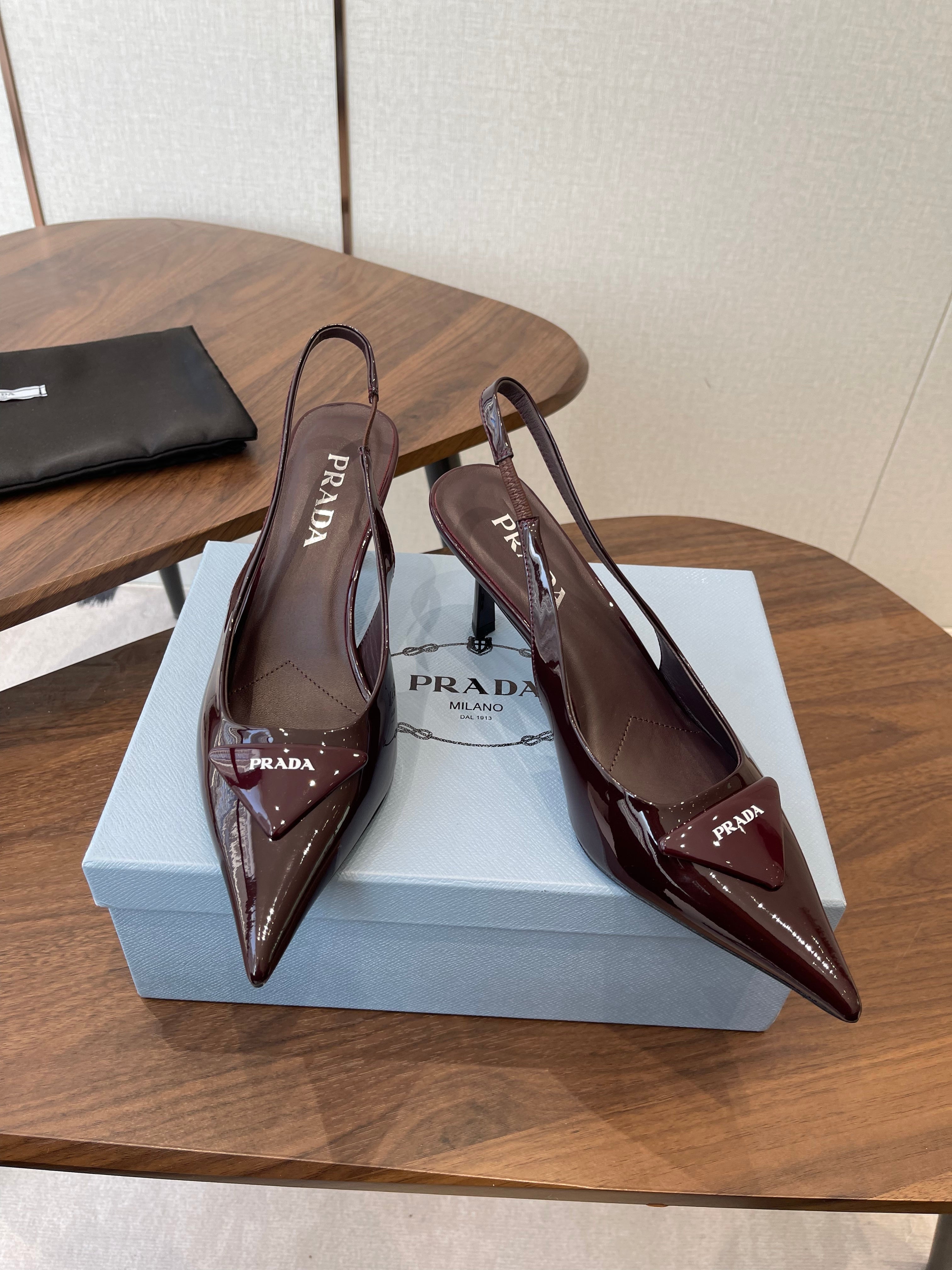 PRADA 26S SLINGBACK PUMPS 75MM IN BURNT BROWN PATENT CALFSKIN WITH LOGO