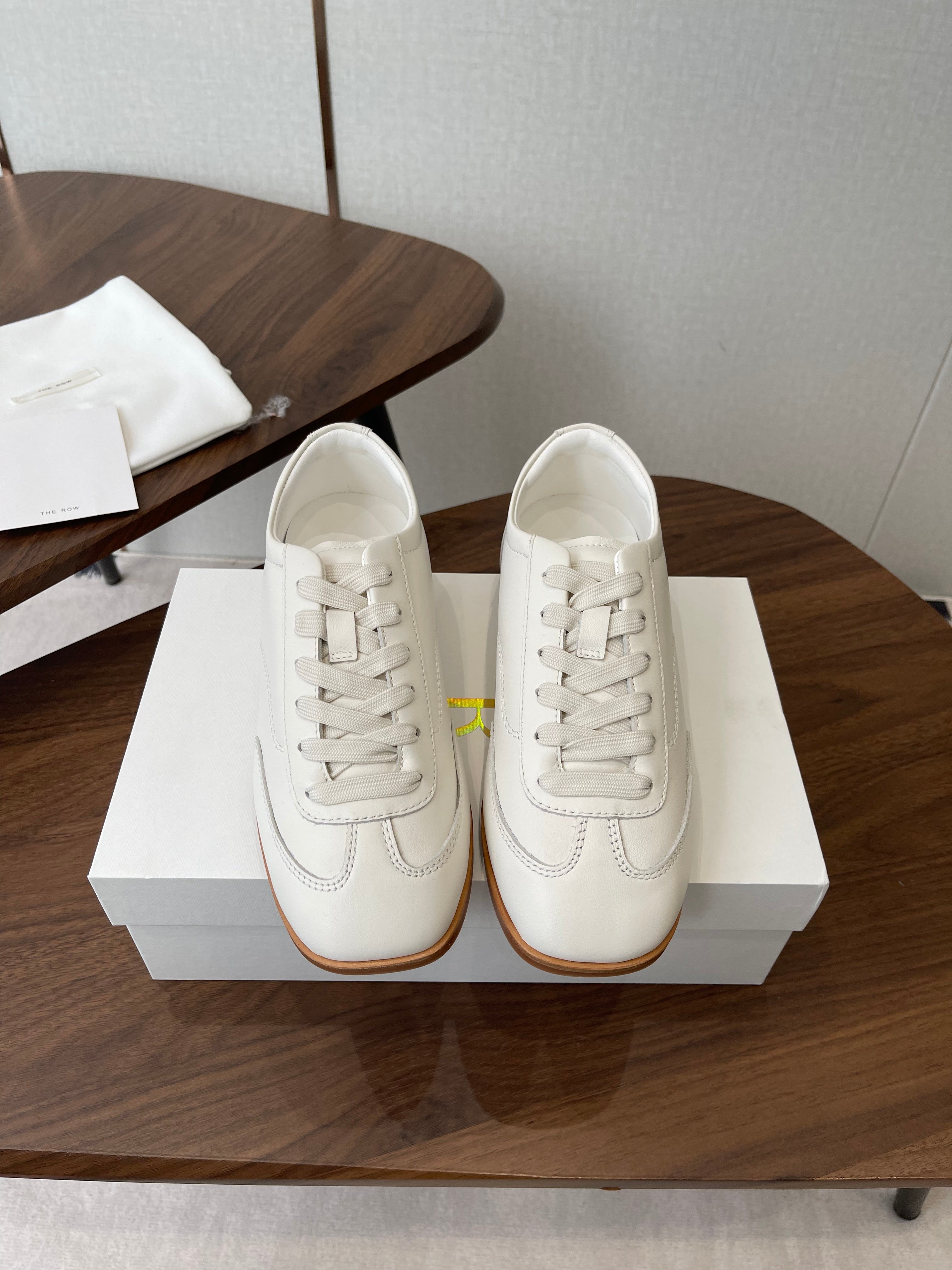THE ROW 26S SNEAKERS IN WHITE CALFSKIN