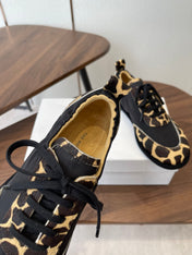 THE ROW 26S SNEAKERS IN LEOPARD PONY HAIR AND BLACK FABRIC