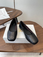 THE ROW 26S FLATS IN BLACK CALFSKIN