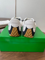BOTTEGA VENETA 26S ORBIT FLASH SNEAKERS IN WHITE AND BLACK SUEDE