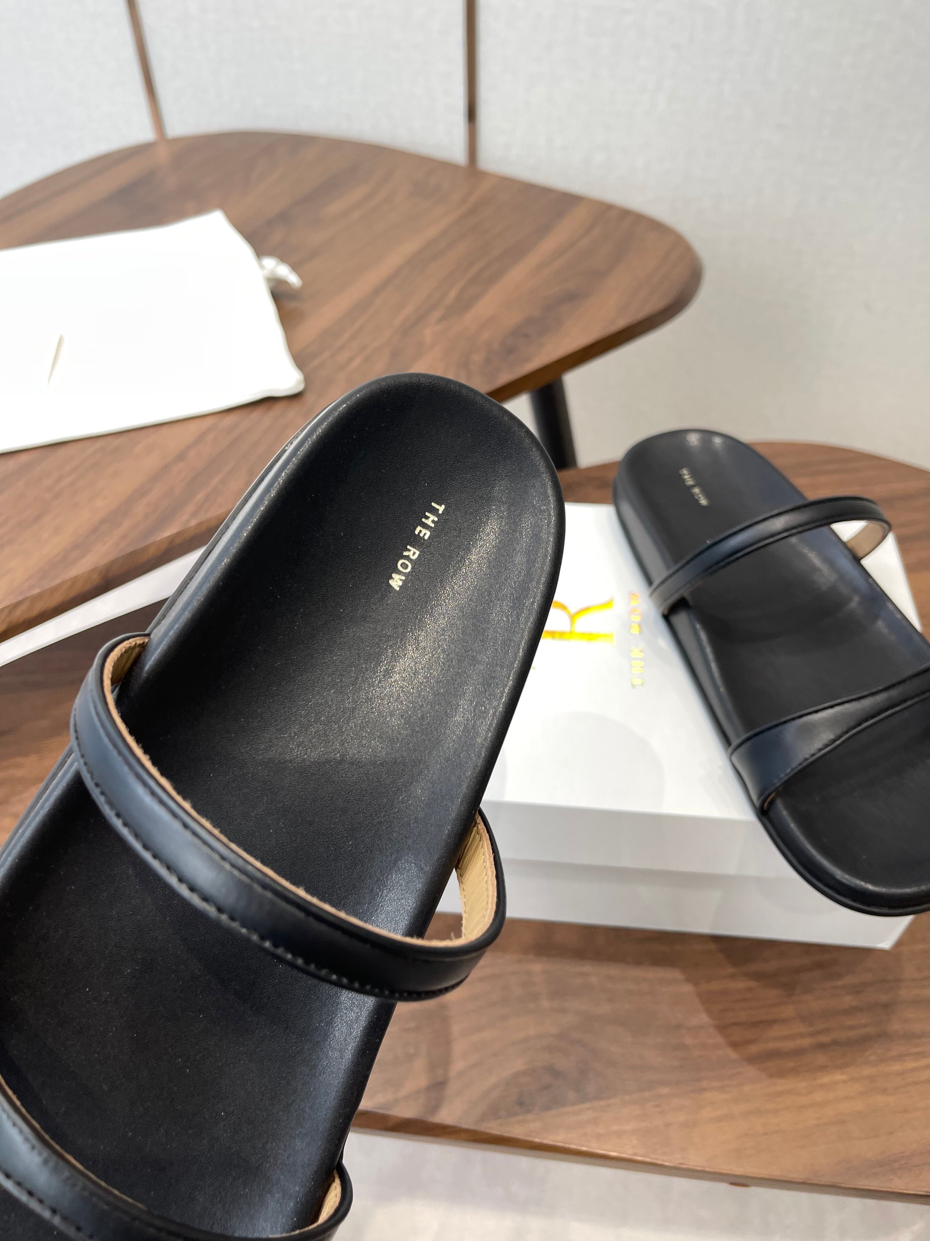 THE ROW 26S DOUBLE STRAP FLAT SANDALS IN BLACK CALFSKIN