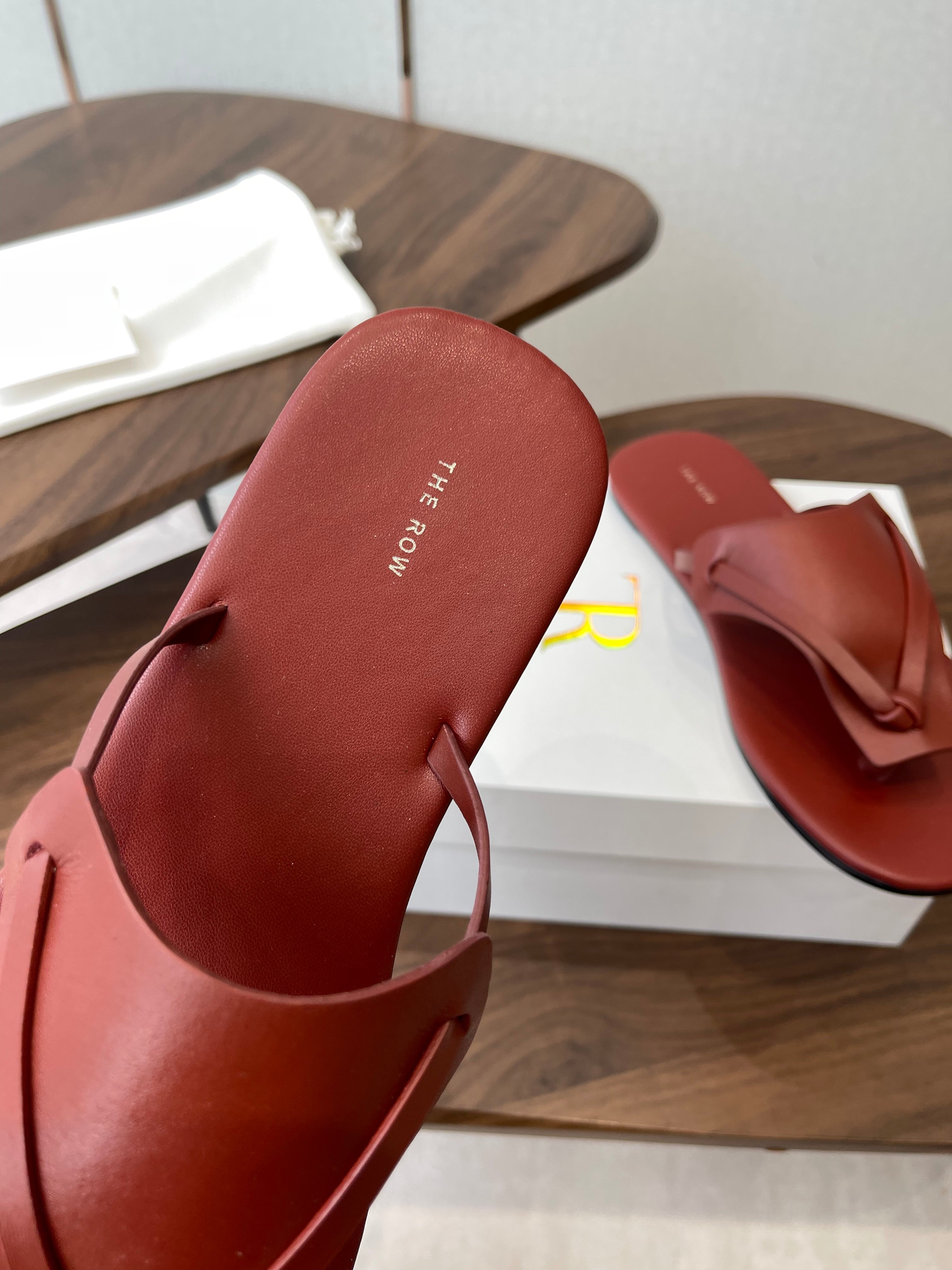 THE ROW 26S T STRAP THONG SANDALS IN RUST RED CALFSKIN