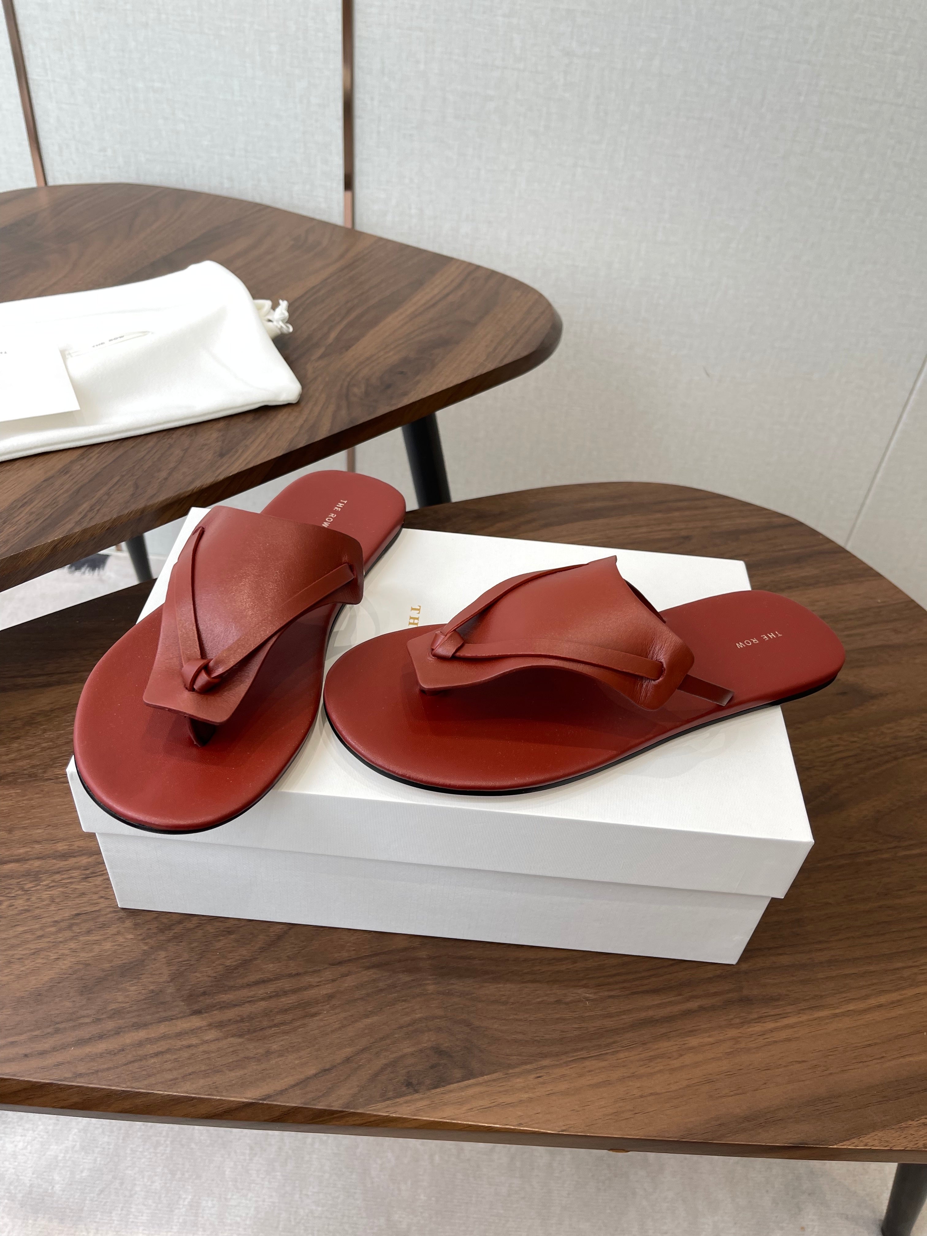 THE ROW 26S T STRAP THONG SANDALS IN RUST RED CALFSKIN