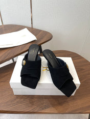 THE ROW 26S BUTTON DETAIL MULE HEELS 70MM IN BLACK SUEDE