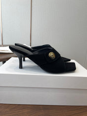 THE ROW 26S BUTTON DETAIL MULE HEELS 70MM IN BLACK SUEDE