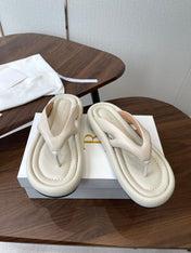 THE ROW 26S PUFFED THONG SANDALS IN IVORY WHITE CALFSKIN