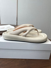THE ROW 26S PUFFED THONG SANDALS IN IVORY WHITE CALFSKIN