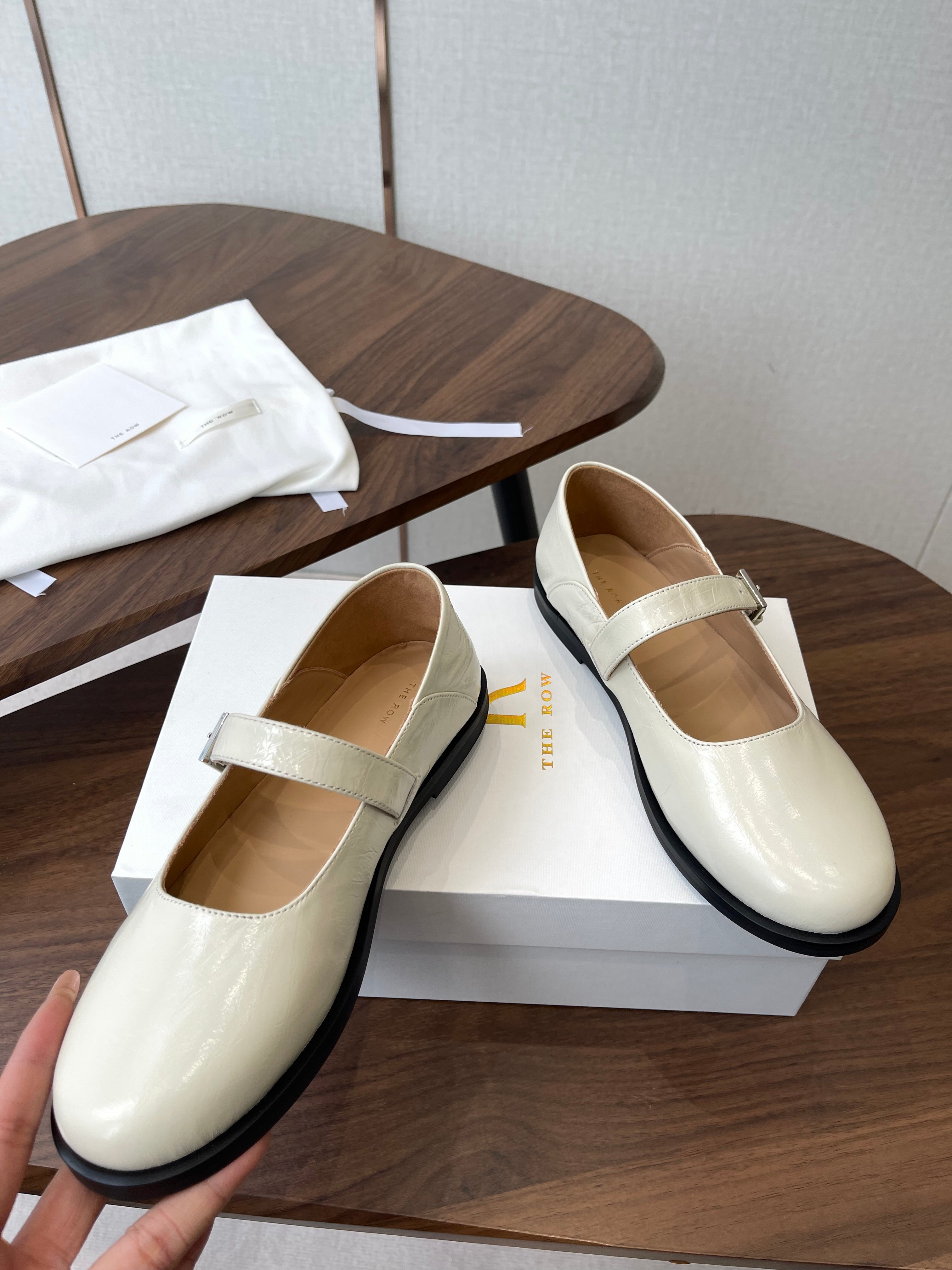 THE ROW 26S MARY JANE FLATS IN WHITE PATENT CALFSKIN