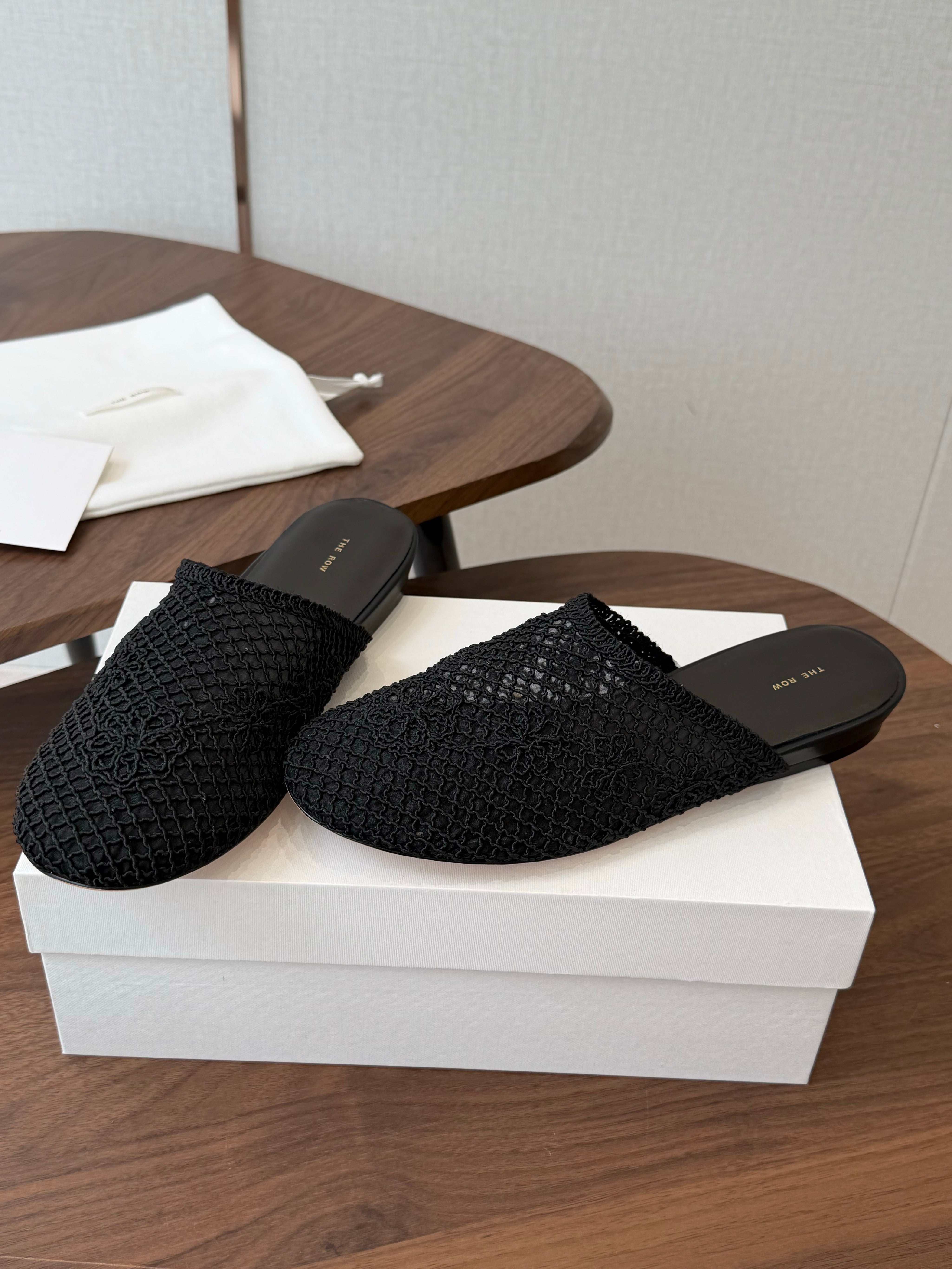 THE ROW 26S MULE FLATS IN BLACK CROCHET MESH
