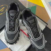 PRADA 26S CLOUDBUST THUNDER SNEAKERS 60MM IN BLACK AND WHITE MESH FABRIC AND TPU