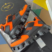 PRADA 26S CLOUDBUST THUNDER SNEAKERS 60MM IN ORANGE RED MESH FABRIC AND TPU