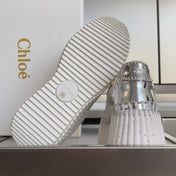 CHLOÉ 26S WEDGE SNEAKERS 70 MM IN WHITE AND SILVER CALFSKIN