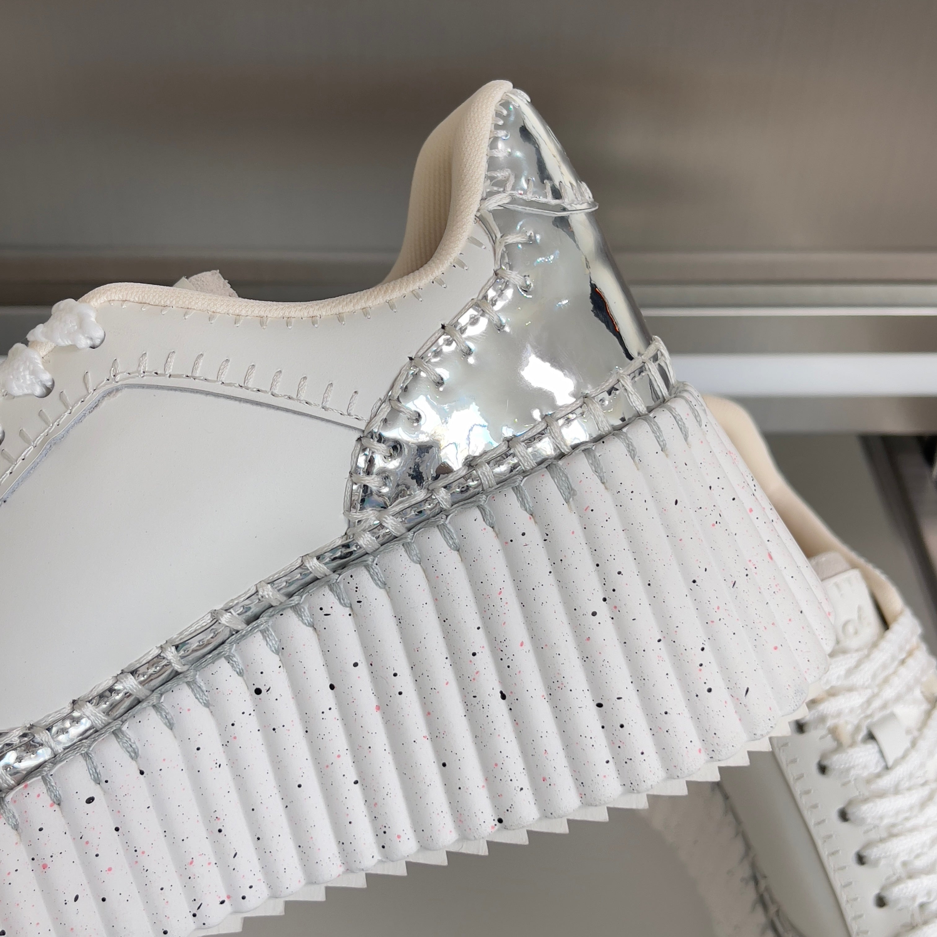 CHLOÉ 26S WEDGE SNEAKERS 70 MM IN WHITE AND SILVER CALFSKIN