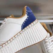 CHLOÉ 26S WEDGE SNEAKERS 70 MM IN WHITE CALFSKIN AND NAVY BLUE SUEDE